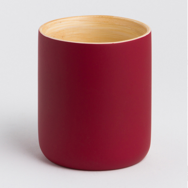 "Close-up of the smooth bamboo rim and artisanal finish of the LY mug"