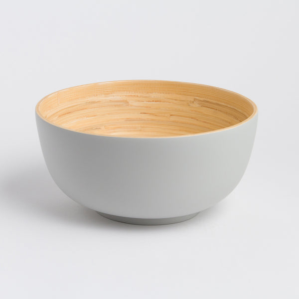 Bowl with gray exterior and wooden interior on a white background